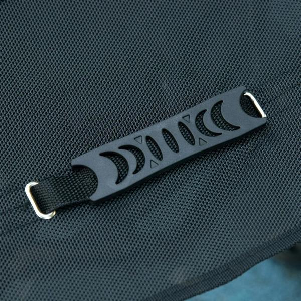 Black step pad with footrest on red and silver rollator walker frame