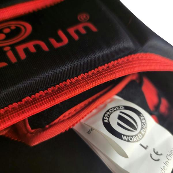 Close-up of black Optimum rugby headguard with red logo, red trim and World Rugby approved label - Optimum