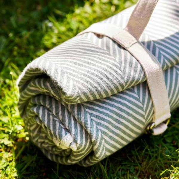 Close-up of the neat border stitching on the herringbone picnic blanket.