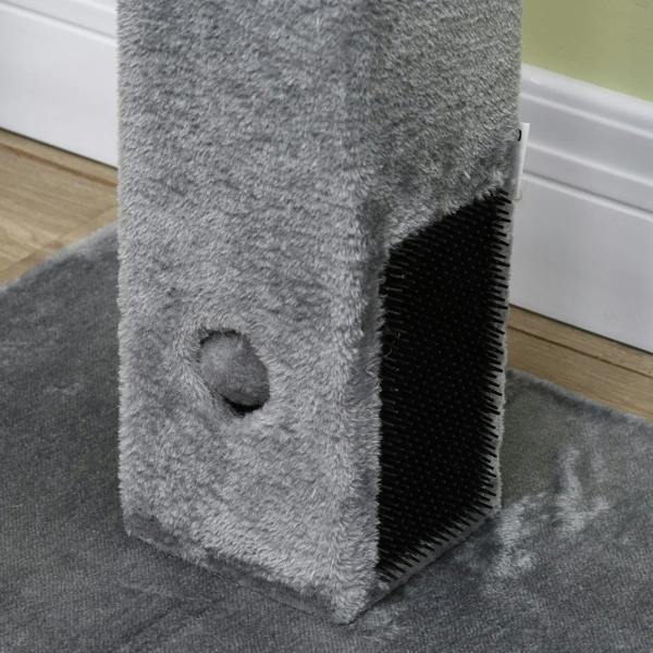 Close-up of grey plush side panel with black bristle self-grooming brush