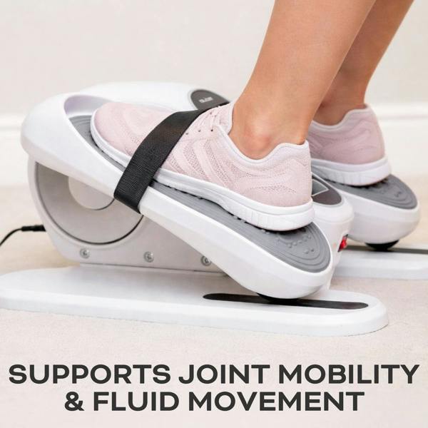 A person wears light pink sneakers while using the Reviber Motorised Mini Elliptical Bike by Reviber, feet strapped in. The text below reads: Supports joint mobility & fluid movement for effective seated exercise.