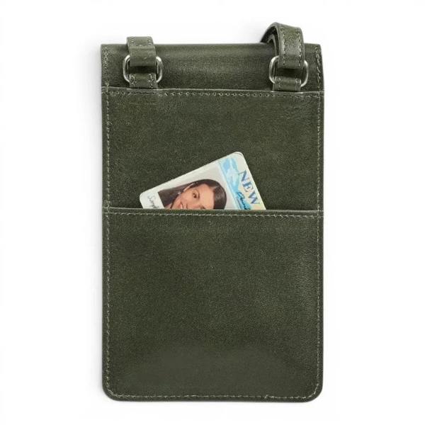 An green faux-leather ID wallet with a top strap and a front slip pocket holding a card, shown against a plain white background.