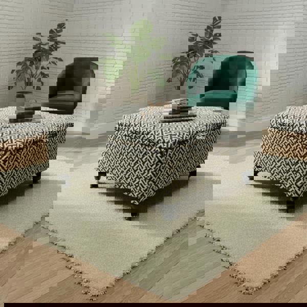 Luxury upholstered storage ottoman footstool used as coffee table bench in modern UK home