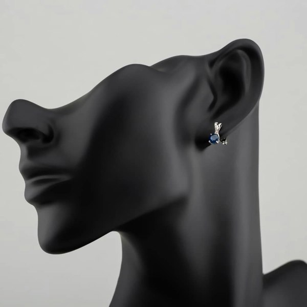 T. H. Baker 9ct White Gold Sapphire & Diamond Crossover Stud Earrings OJE1703-BS