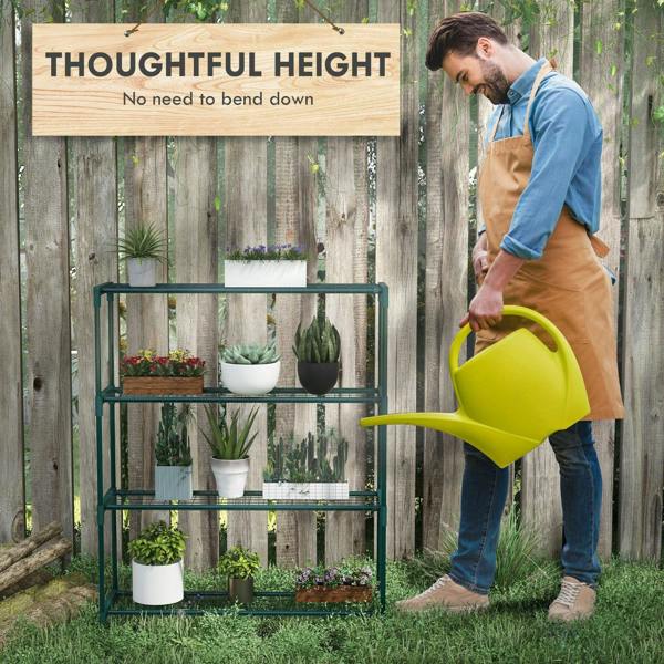 Green four-tier plant shelf with wire-grid tiers, holding multiple small pots.