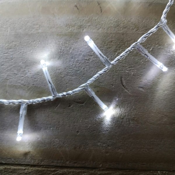 Samuel Alexander 1000 LED 25m Indoor Outdoor Christmas Multi Function Mains Operated String Lights with Timer & Clear Cable in Cool White