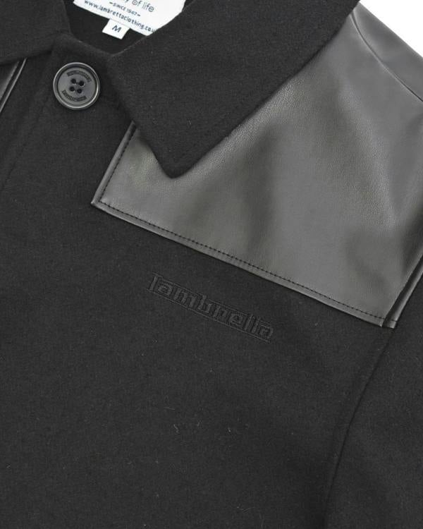 Lambretta Mens Donkey Jacket Classic MOD SKA Shoulder Panel, close-up of the black wool collar with button, leather shoulder panel and Lambretta logo embroidered on the coat.