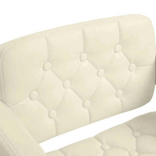 Close-up of beige button-tufted backrest on a padded swivel bar stool