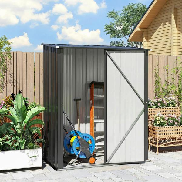 Black corrugated steel garden shed with open double doors and outdoor tools inside