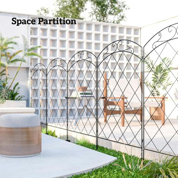 Black steel fence panels used as patio space partition with diamond lattice and scroll top