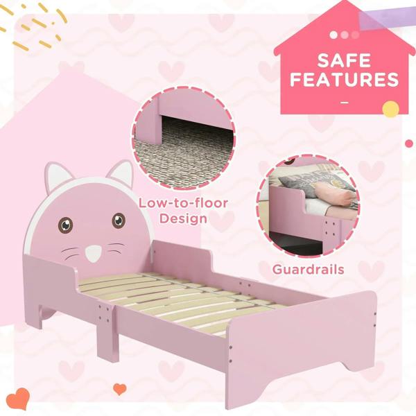 Pink toddler bed frame with cat-themed headboard and guardrails, low-to-floor design.