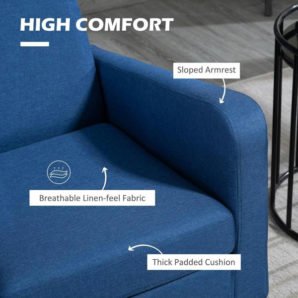 Blue armchair close-up of sloped armrest and thick padded seat cushion.