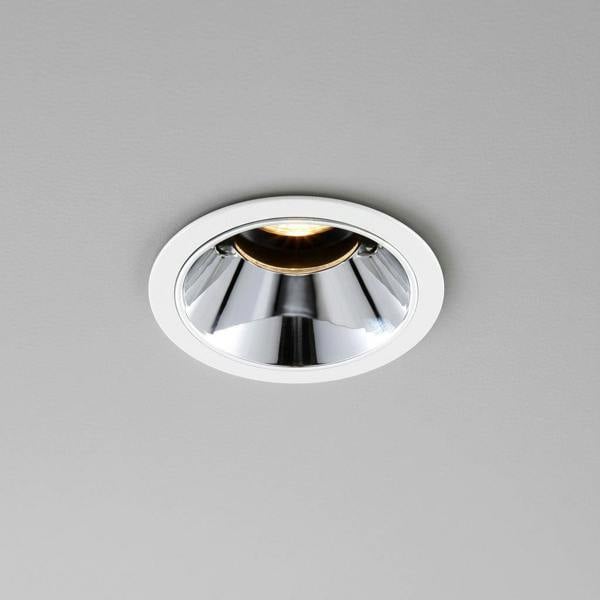 polished chrome downlight installed on a grey ceiling 