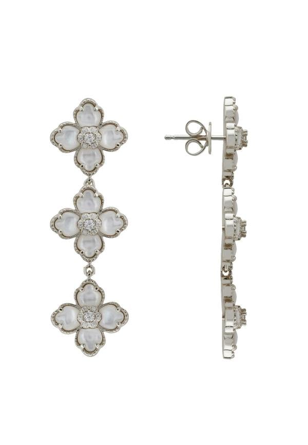 Floral earrings with white stones on a white background