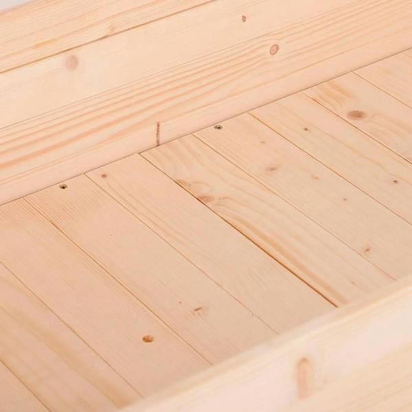 Wooden raised planter top boards close-up with smooth light pine grain and screw holes