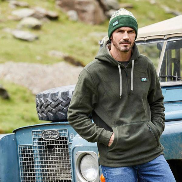 Man wearing the Ridgeline Ballistic fleece hoodie with large kangaroo pocket