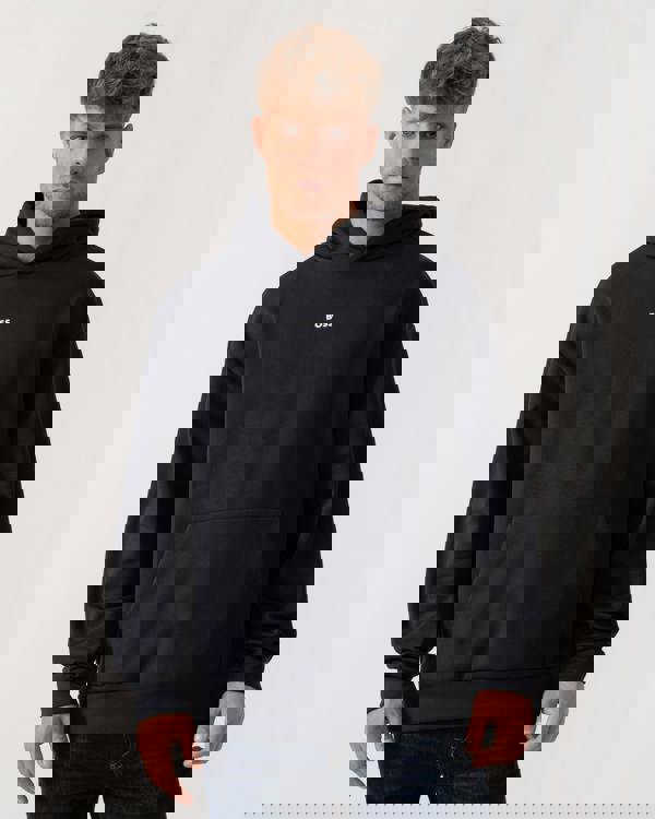 Model wearing BOSS Green Sly Zone Mens Pullover Hoodie in Dark Blue 403 - Main