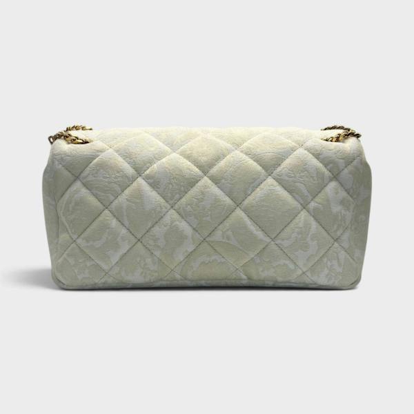 Supplied Fashion beige quilted shoulder bag with gold chain strap and subtle floral pattern