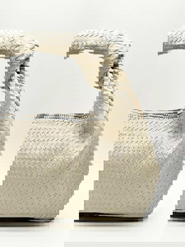 SVNX Woven Grab bag with Knotted Strap in unbleached