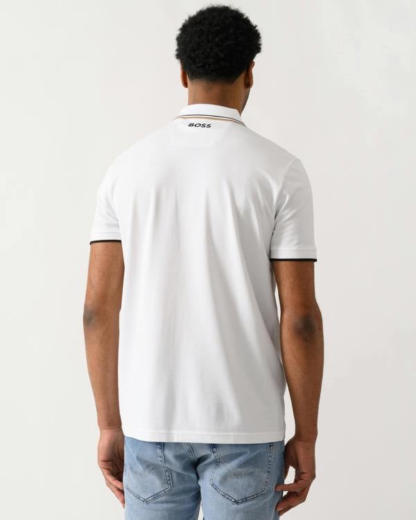 back shot of a model wearing a BOSS Green Paddy Pro Mens Cotton Blend Polo Shirt With Contrast Logos in Natural 103 colour