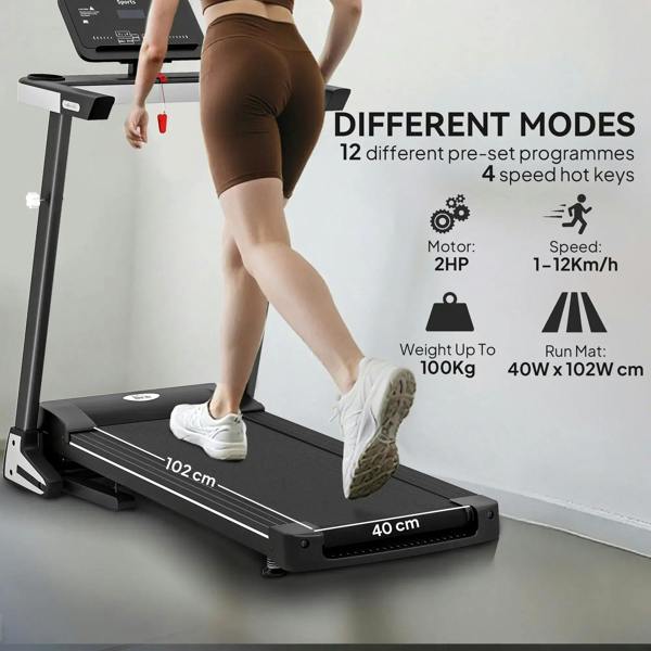 Black motorised folding treadmill with running belt and console controls during use