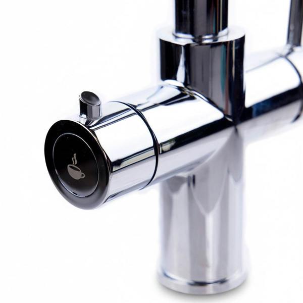 close up of a modern round neck pull out chrome boiling water tap on a white background