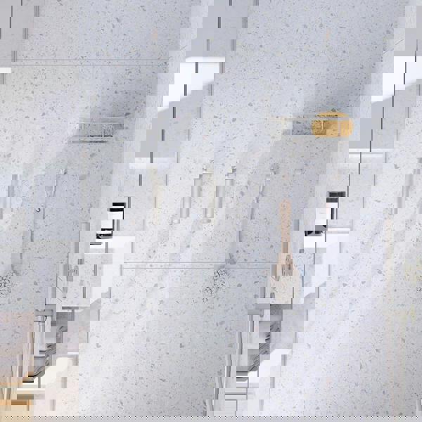 Pair of brushed nickel towel hook on bathroom wall