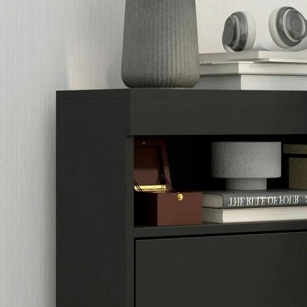 High-gloss black shoe storage cabinet with flip door open and stacked shoe shelves inside