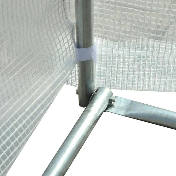 White mesh greenhouse cover attached to galvanized metal frame corner tube