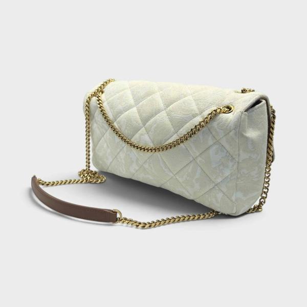 Supplied Fashion beige quilted shoulder bag with gold chain strap and Medusa head motif in a structured silhouette.
