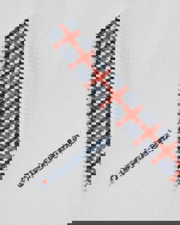 Lambretta Mens Classic Dress Gingham Mod Retro Ska Casual Polo, close-up of the white polo shirt with a checkered gingham band detail in red, navy blue, and white, featuring Lambretta logo.