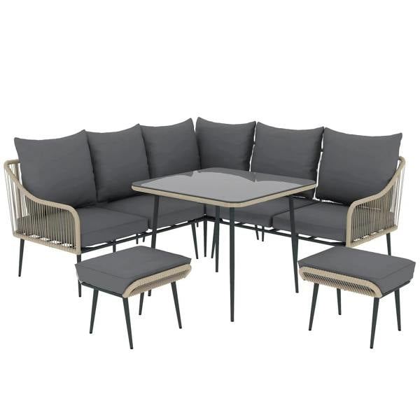 Outdoor rattan sofa set with coffee table, dark grey cushions, and light brown frames