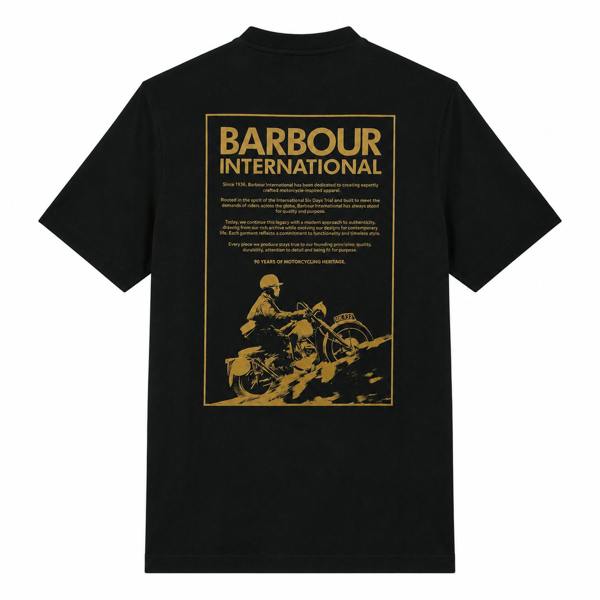 Black Barbour International 90th anniversary graphic t-shirt featuring a gold motorcycle print and heritage text.