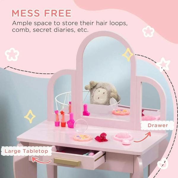 Pink kids vanity table with arched mirror, accessories on tabletop, and storage drawer