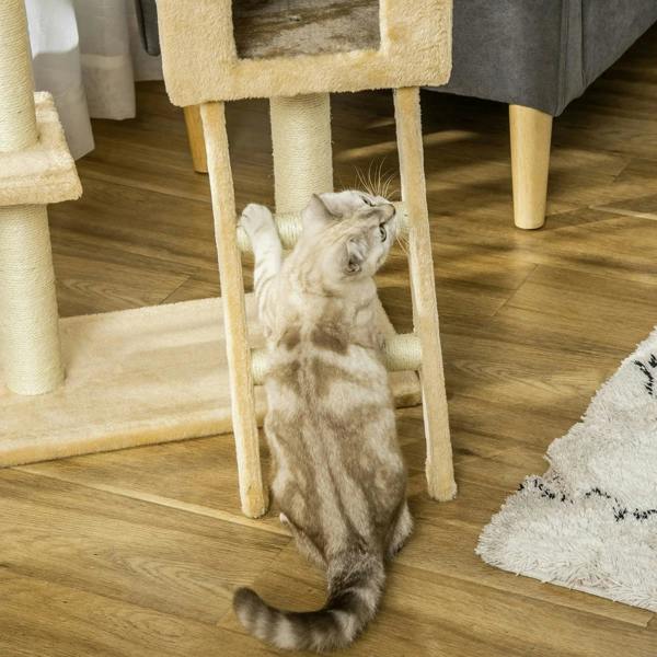 Beige cat tree tower ladder with a kitten sitting on the lower step area
