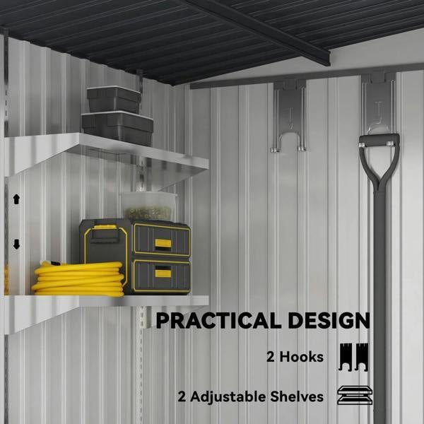 Interior of white metal shed showing adjustable shelves and storage hooks