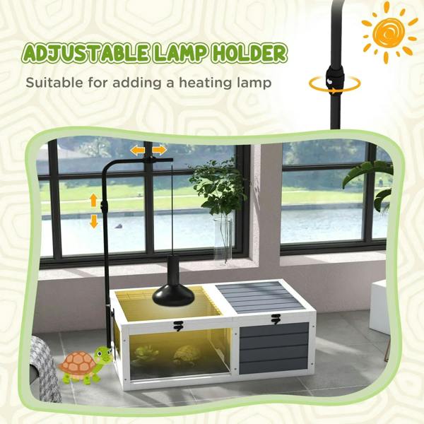 Tortoise habitat table with adjustable black lamp holder above wire basking area.