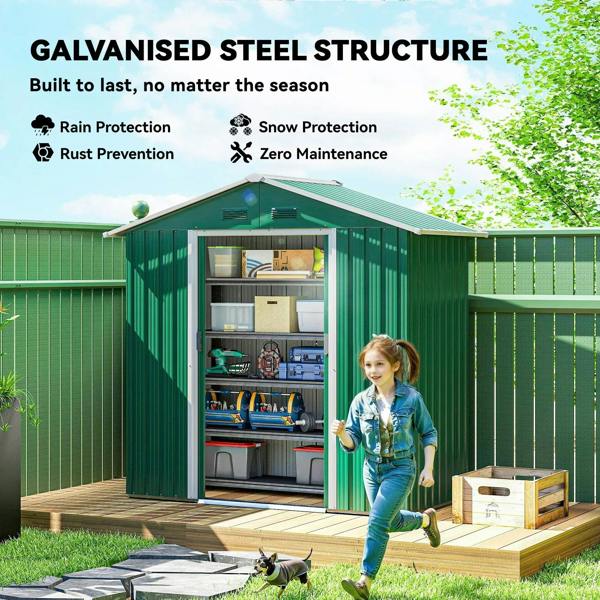 Green metal storage shed with open double doors and built-in shelves for tools