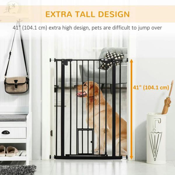Black extra-tall pet gate with vertical bars and small bottom cat flap opening
