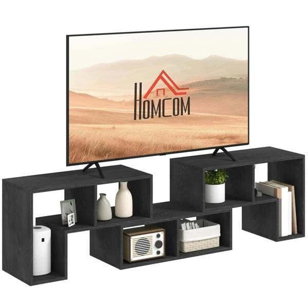 Three-block modular TV stand in black wood-effect with open cube shelves for TV and storage