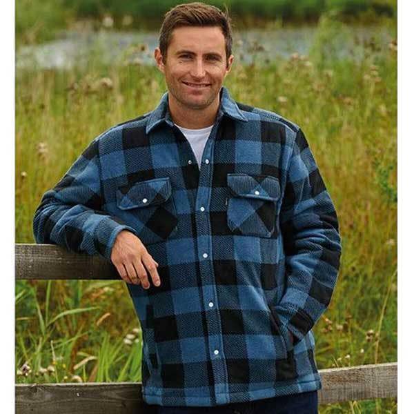 Blue check Kinross padded shirt worn in open field perfect for walking and outdoor jobs