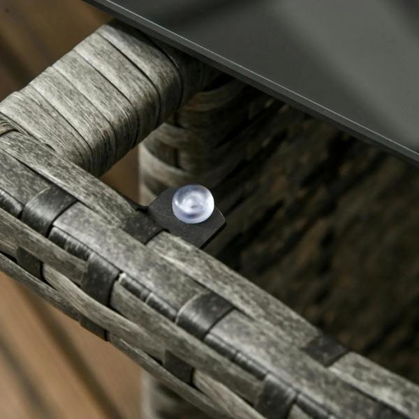 Close-up of gray rattan arm joint hardware and tabletop support