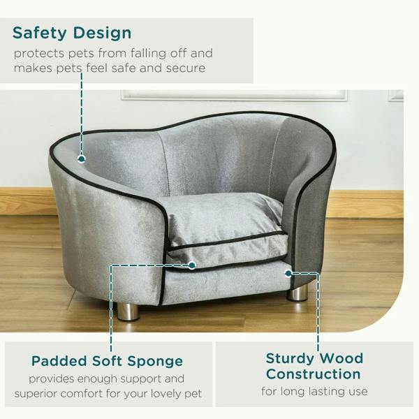 Grey pet sofa chair with black piping, silver legs, and padded armrests