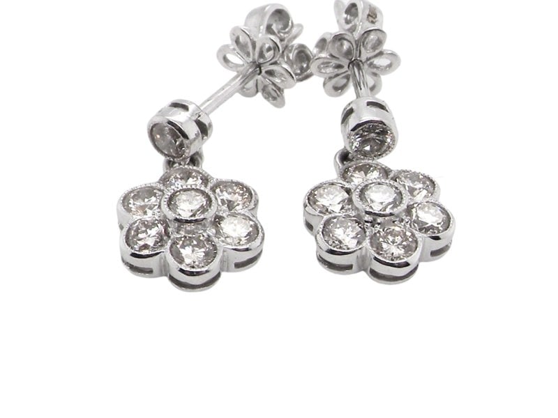 A pair of diamond cluster earrings