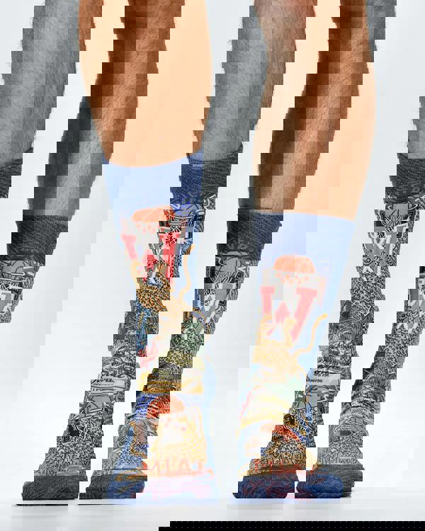 Colorful socks with sports-themed design on a white background