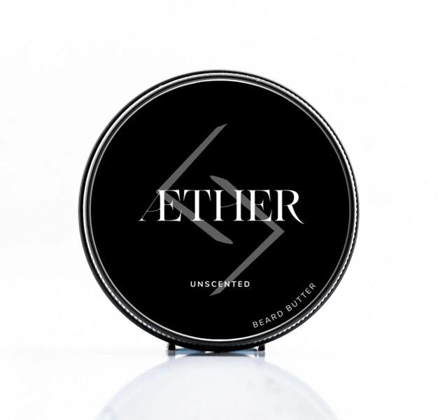 Black container of Ether Unscented Beard Butter on a white background