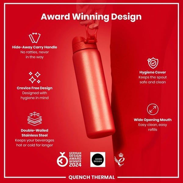A red, double-walled stainless steel water bottle is being held. It features a hide-away handle, crevice-free design, hygiene cover, and wide mouth. The bottle is an award-winning design.