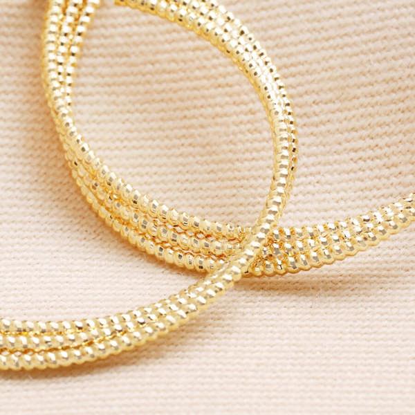 Gold Triple Layered Thread Hoop Earrings - close-up detail