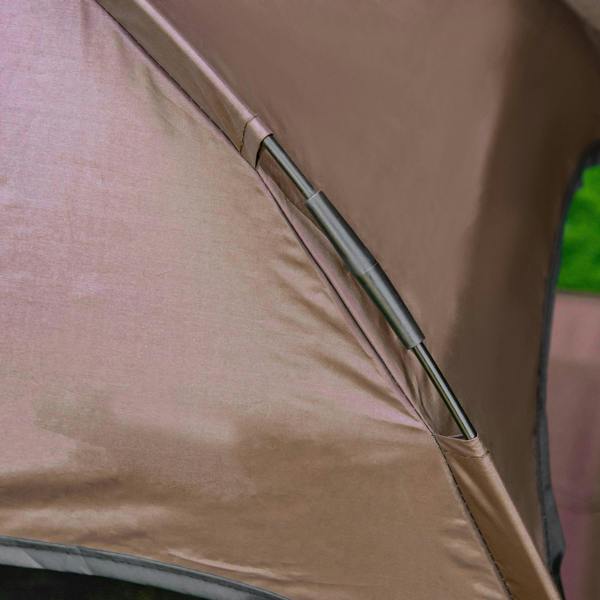 Close-up of brown canopy fabric edge with metal support rod on elevated pet cot