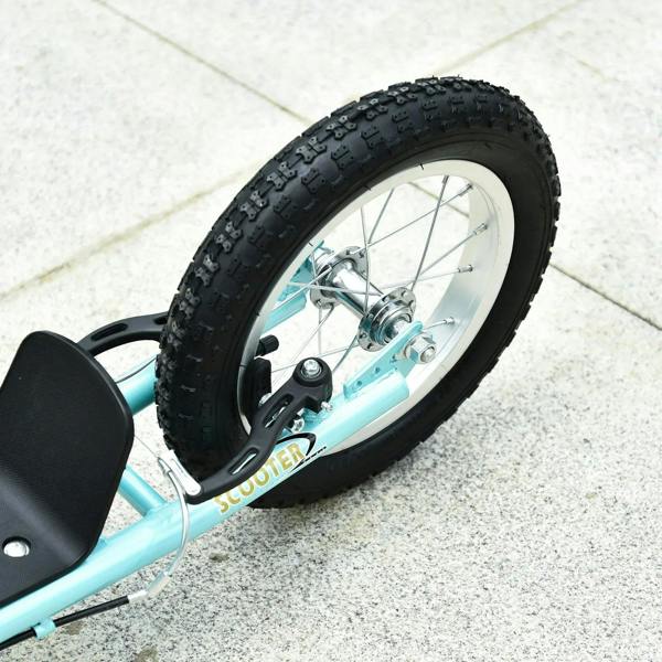 Close-up of front wheel and fork on turquoise kids stunt scooter with black tire.
